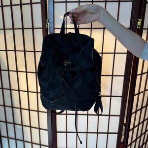 Coach Black Signature Nylon Drawstring Backpack with Logo Plaque
